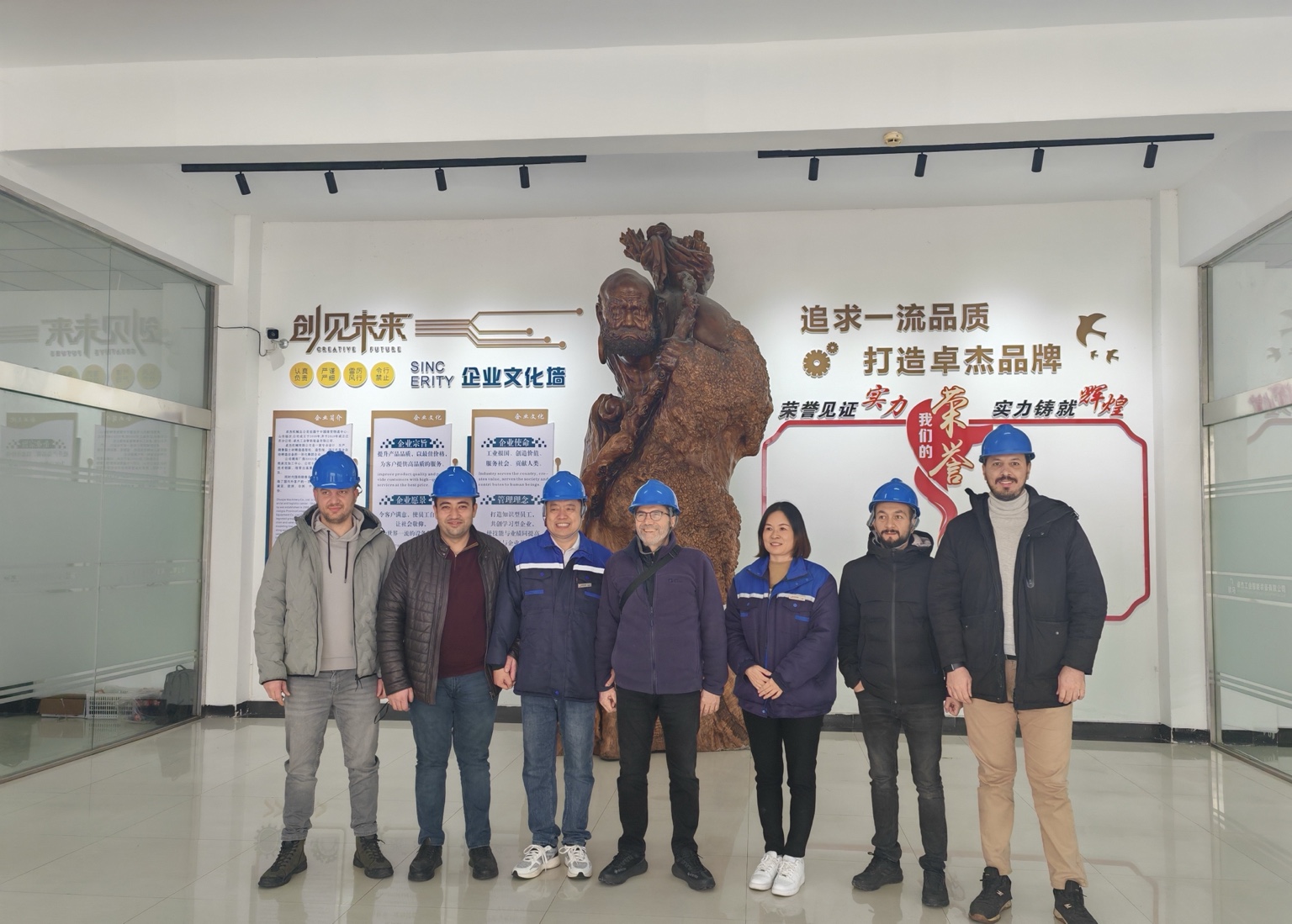 International buyers and factory representatives during an industrial factory visit in China